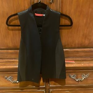 Alice & Olivia black leather trimmed vest.